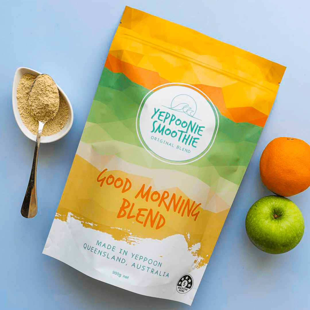 Yeppoonie Smoothie Good Morning Blend 450gm package with a spoon of powder, an orange, and a green apple.